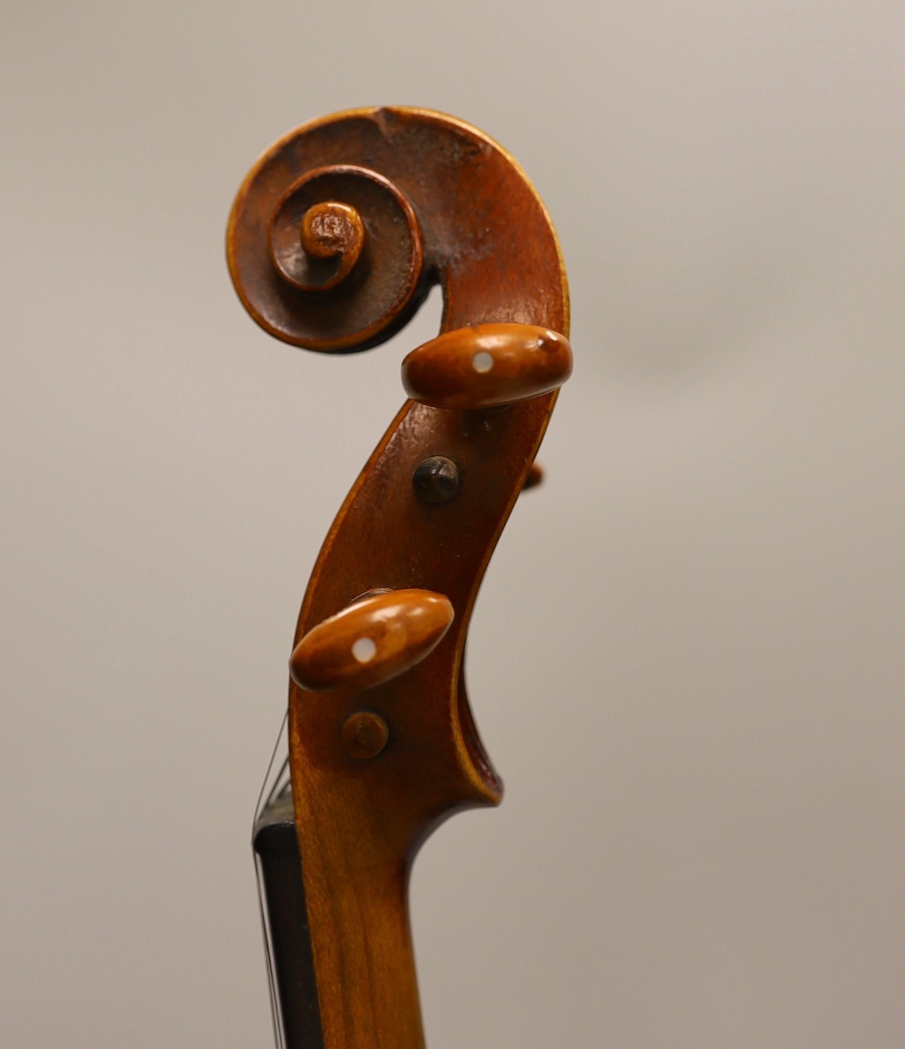 A French single back violin, interior label reads ‘Médio Fino’, back measures 35.5cm excl button. With case and bow